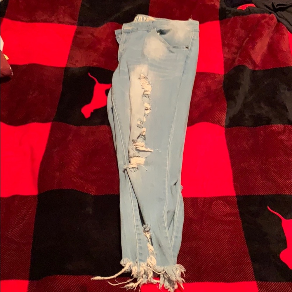 Light blue ripped jeans. Worn 3 times